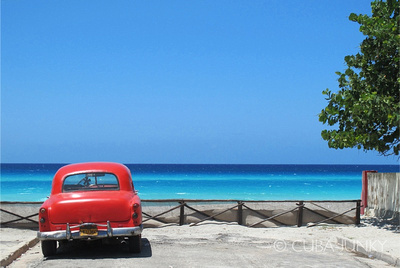 Old car parked at the beach Varadero Cuba